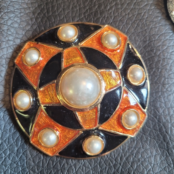 Faux pearl orange and black enamel craft stamped brooch
